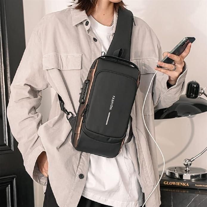 Black leather sling bag for men with zipper closure, worn crossbody style