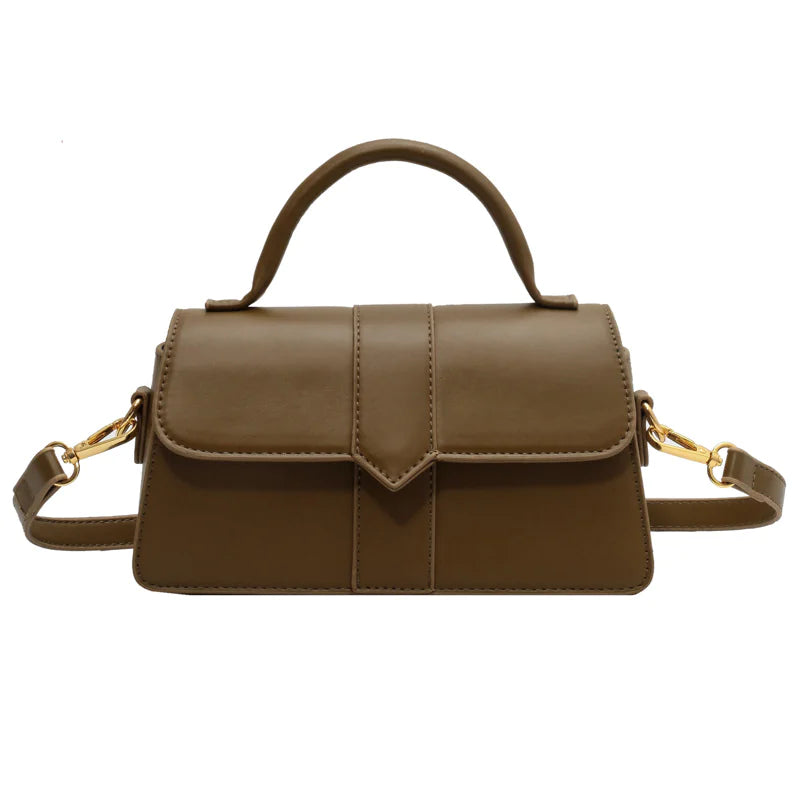 Stylish brown women bag with top handle and adjustable shoulder strap for daily commute and versatile use