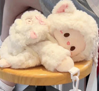 Small cream Cute Lamb Plush Bag with ultra-soft material and zip closure on wooden stool