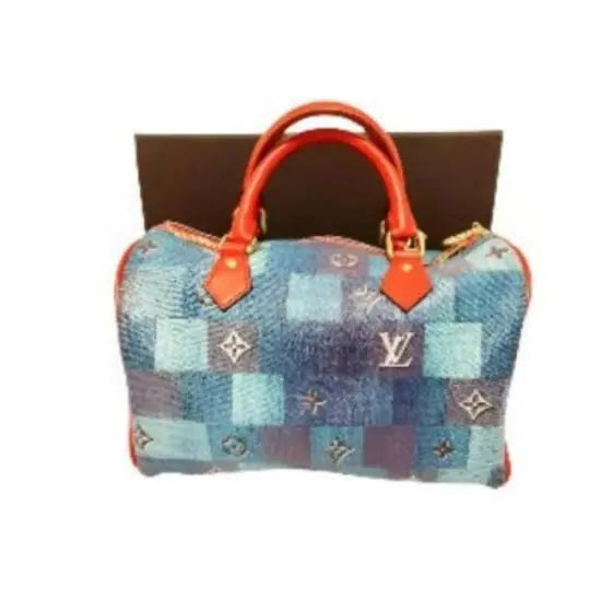 Women Lux BAG stylish patchwork design handbag with red handles and gold accents