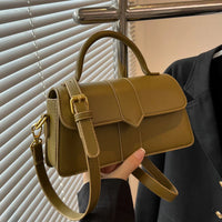 Stylish olive green women bag with adjustable strap and top handle, perfect for daily commute and versatile outfits